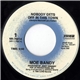 Moe Bandy - Nobody Gets Off In This Town / Back In My Roarin' 20's